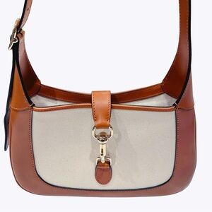 GUCCI Small Jackie Canvas Shoulder Bag
Brown leather (Calf), white canvas